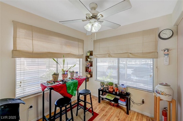 5196 Mandalay Springs Dr Unit 101, Las Vegas, NV 89120 - dining space featuring healthy amount of natural light, wood finished floors, and a ceiling fan