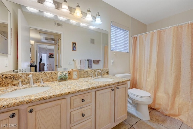5196 Mandalay Springs Dr Unit 101, Las Vegas, NV 89120 - bathroom with double vanity, tile patterned flooring, and a shower with curtain