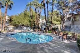 5196 Mandalay Springs Dr Unit 101, Las Vegas, NV 89120 - community pool with a patio area