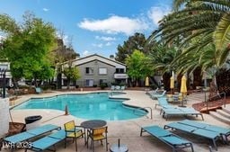 5196 Mandalay Springs Dr Unit 101, Las Vegas, NV 89120 - community pool featuring a patio area