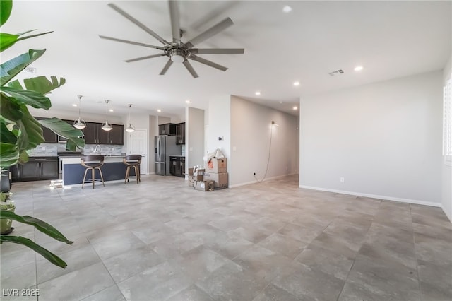 7732 Bandon Cliffs St, North Las Vegas, NV 89084 - living room with a ceiling fan and recessed lighting