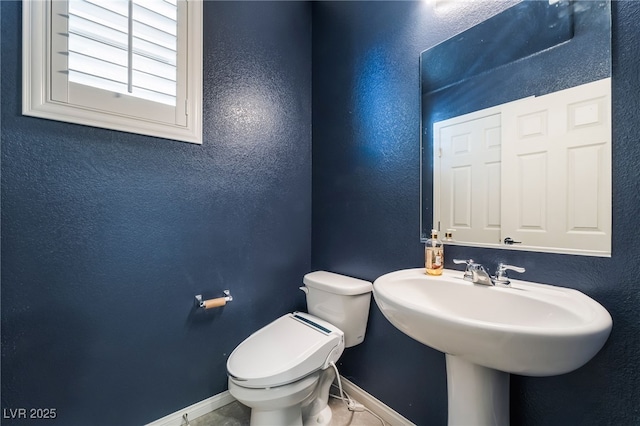 7732 Bandon Cliffs St, North Las Vegas, NV 89084 - bathroom with toilet and baseboards
