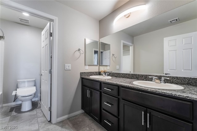 7732 Bandon Cliffs St, North Las Vegas, NV 89084 - full bathroom with double vanity and tile patterned flooring