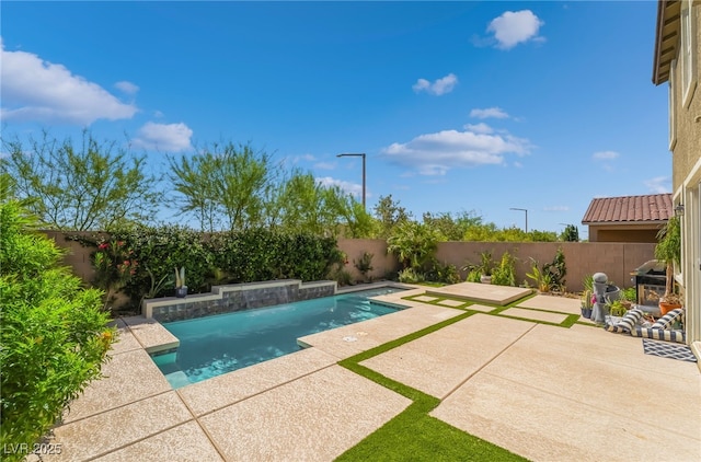 7732 Bandon Cliffs St, North Las Vegas, NV 89084 - view of swimming pool featuring a patio area and a fenced backyard