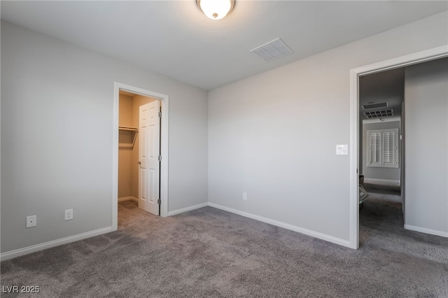 7732 Bandon Cliffs St, North Las Vegas, NV 89084 - unfurnished bedroom with carpet flooring and a spacious closet