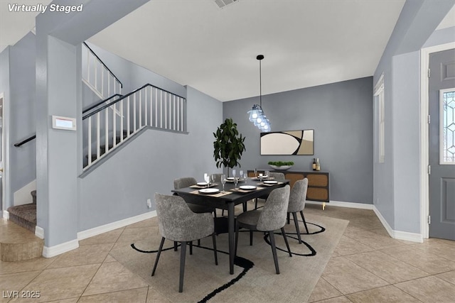 1306 Big Tree Ave, North Las Vegas, NV 89031 - dining area featuring stairs, tile patterned flooring, and baseboards