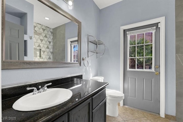 1306 Big Tree Ave, North Las Vegas, NV 89031 - bathroom with vanity, toilet, and tile patterned floors