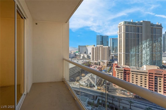 135 E Harmon Ave Unit 1621, Las Vegas, NV 89109 - balcony featuring a view of city
