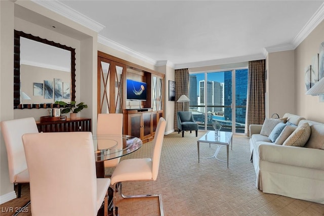 135 E Harmon Ave Unit 1621, Las Vegas, NV 89109 - carpeted dining room featuring crown molding and baseboards