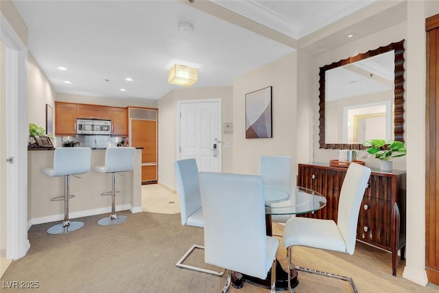 135 E Harmon Ave Unit 1621, Las Vegas, NV 89109 - dining space with ornamental molding, recessed lighting, and baseboards