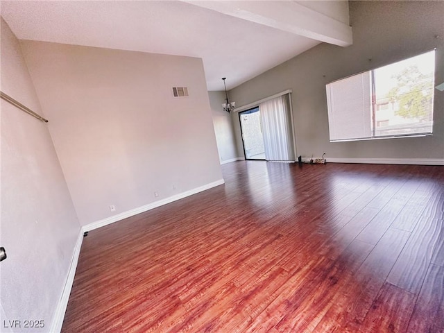 4331 Sanderling Cir Unit 46, Las Vegas, NV 89103 - spare room with wood finished floors, baseboards, a chandelier, and beamed ceiling