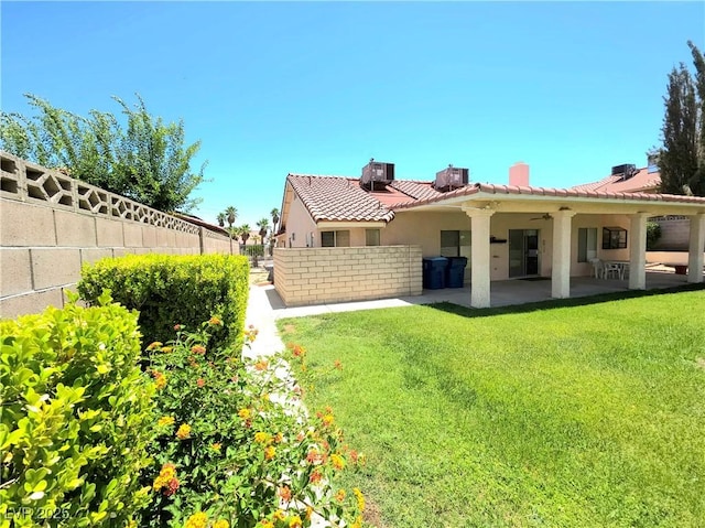 1536 Brocado Ln, Las Vegas, NV 89117 - rear view of property with a chimney, stucco siding, a tiled roof, a patio, and a ceiling fan