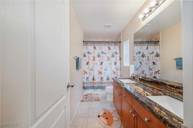 9032 Retro Ct, Las Vegas, NV 89149 - bathroom with toilet, double vanity, tile patterned flooring, and shower / bath combo