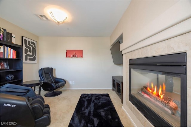 9032 Retro Ct, Las Vegas, NV 89149 - living area featuring light carpet, a fireplace, and baseboards