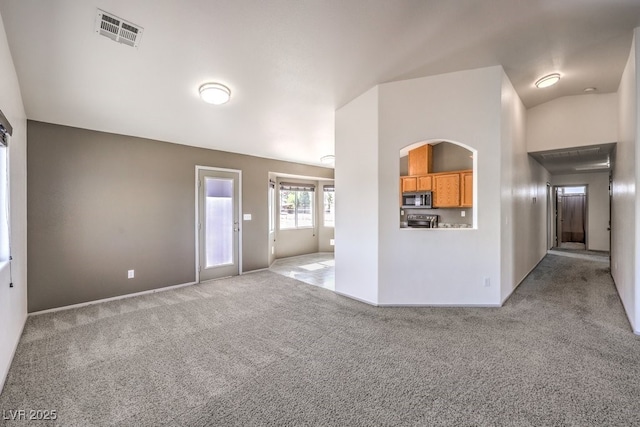 861 S Ford Loop, Pahrump, NV 89048 - unfurnished living room featuring carpet floors and baseboards