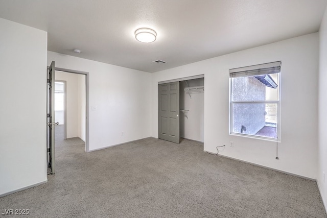 861 S Ford Loop, Pahrump, NV 89048 - unfurnished bedroom featuring carpet floors and a closet