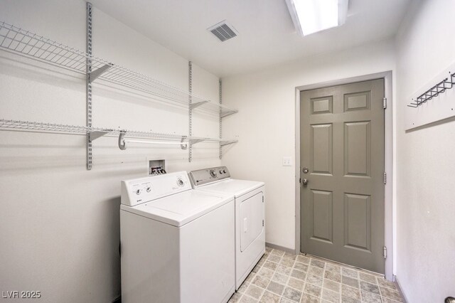 861 S Ford Loop, Pahrump, NV 89048 - washroom featuring separate washer and dryer and baseboards