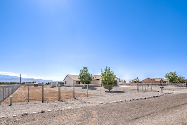 861 S Ford Loop, Pahrump, NV 89048 - obstructed view of property featuring a gate