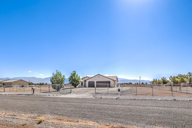 861 S Ford Loop, Pahrump, NV 89048 - fenced yard featuring a mountain view and driveway