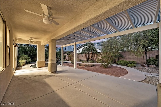 9008 Sawhill Pond St, Las Vegas, NV 89131 - fenced backyard with a ceiling fan, a patio area, and a pergola