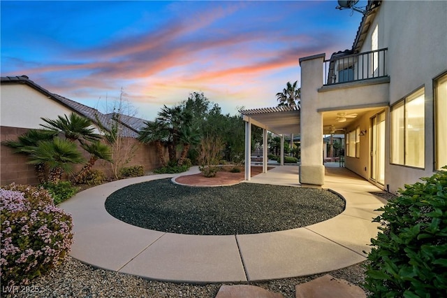 9008 Sawhill Pond St, Las Vegas, NV 89131 - fenced backyard featuring a balcony and a patio area