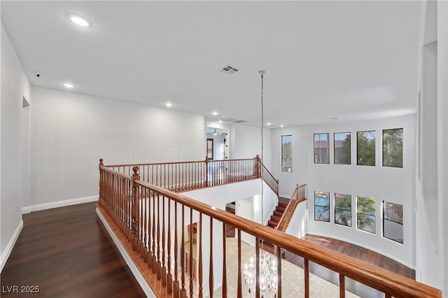 9008 Sawhill Pond St, Las Vegas, NV 89131 - hall featuring an upstairs landing, wood finished floors, baseboards, and recessed lighting