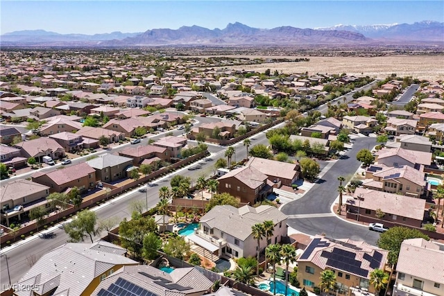 9008 Sawhill Pond St, Las Vegas, NV 89131 - aerial perspective of suburban area with a mountain backdrop