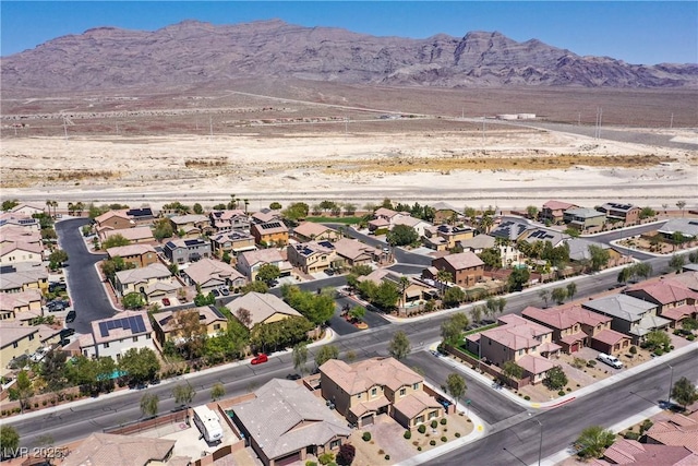 9008 Sawhill Pond St, Las Vegas, NV 89131 - aerial view of property's location featuring a mountain backdrop and nearby suburban area