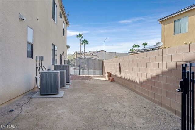 9008 Sawhill Pond St, Las Vegas, NV 89131 - fenced yard with a gate and cooling unit