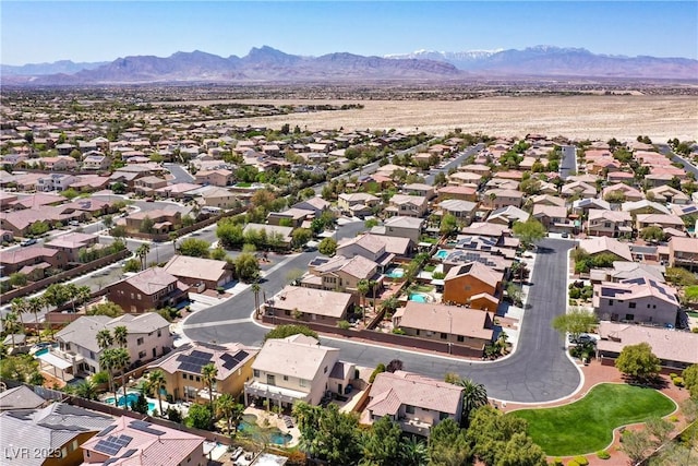 9008 Sawhill Pond St, Las Vegas, NV 89131 - aerial perspective of suburban area featuring a mountainous background