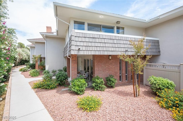 794 Oakmont Ave Unit 106, Las Vegas, NV 89109 - view of property exterior featuring brick siding and stucco siding