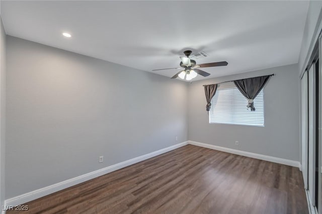 2708 Beaver Creek Ct Unit 202, Las Vegas, NV 89117 - unfurnished bedroom with baseboards, a closet, dark wood finished floors, recessed lighting, and ceiling fan
