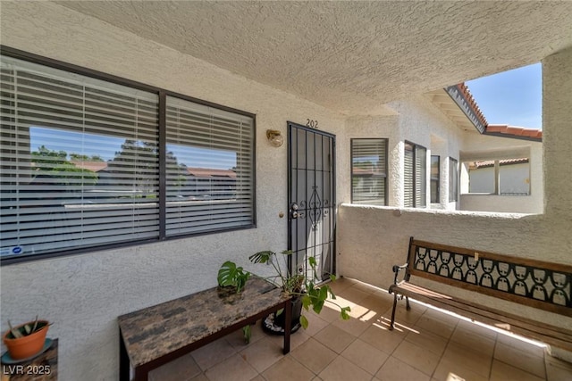 2708 Beaver Creek Ct Unit 202, Las Vegas, NV 89117 - doorway to property featuring stucco siding