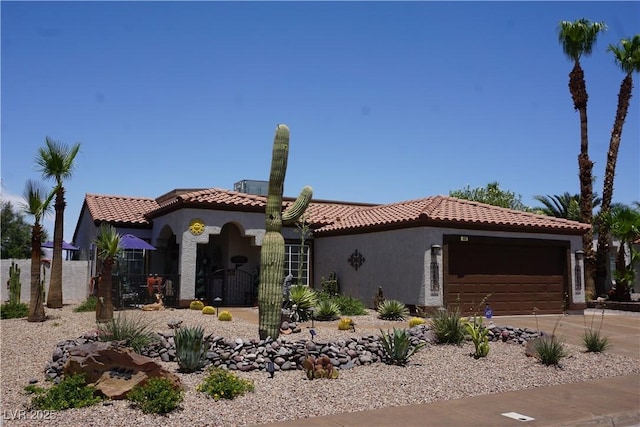 444 Viewmont Dr, Henderson, NV 89015 - mediterranean / spanish house with a garage, stucco siding, a tiled roof, and driveway