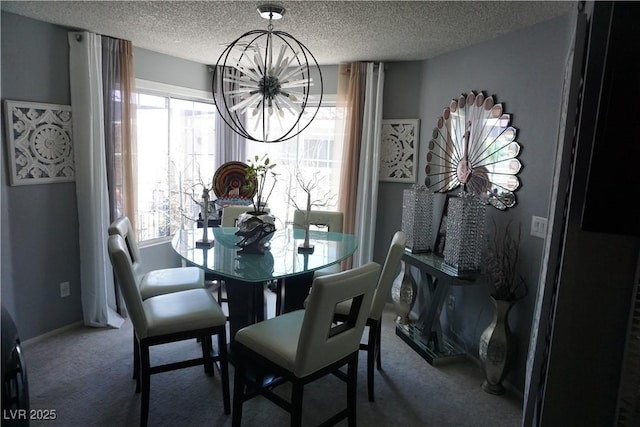 444 Viewmont Dr, Henderson, NV 89015 - carpeted dining area with a chandelier, a textured ceiling, and baseboards