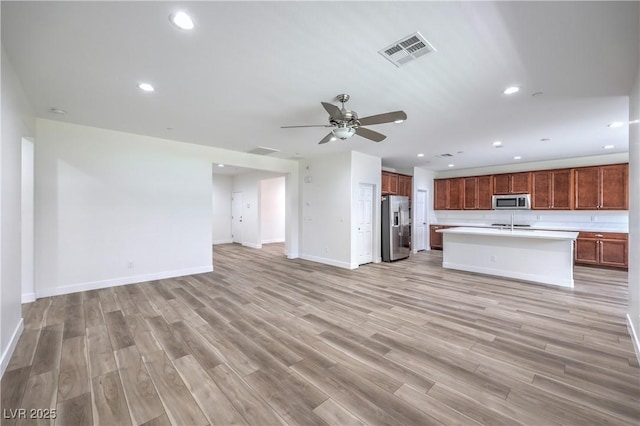 508 Cadence View Way, Henderson, NV 89011 - unfurnished living room featuring a ceiling fan, light wood-style floors, baseboards, and recessed lighting