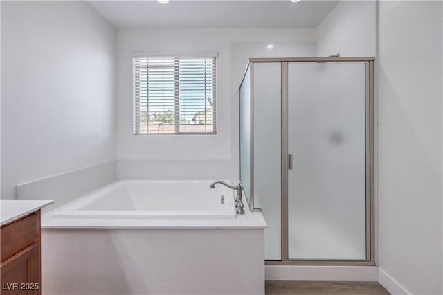 508 Cadence View Way, Henderson, NV 89011 - bathroom with vanity, a stall shower, and a bath