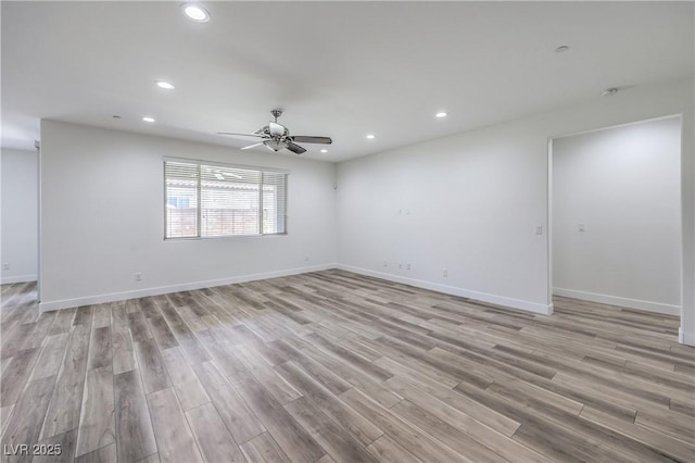 508 Cadence View Way, Henderson, NV 89011 - spare room with light wood-type flooring, recessed lighting, a ceiling fan, and baseboards
