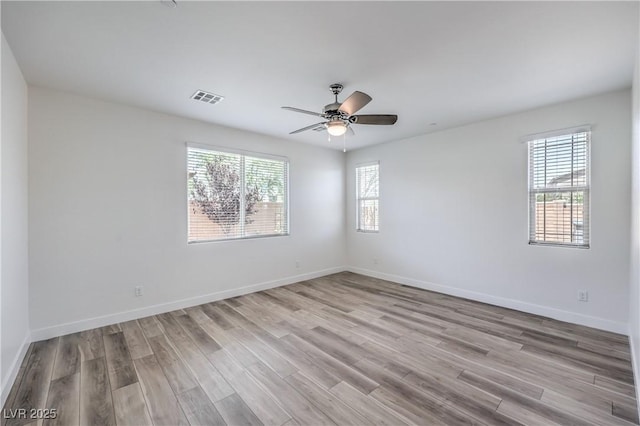 508 Cadence View Way, Henderson, NV 89011 - empty room with light wood-type flooring, a ceiling fan, and baseboards