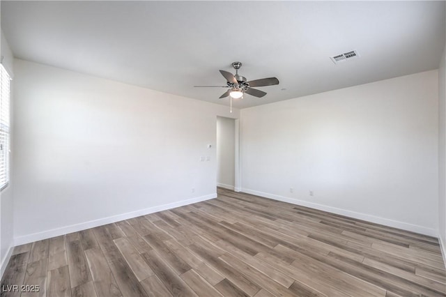 508 Cadence View Way, Henderson, NV 89011 - spare room with wood finished floors, ceiling fan, and baseboards
