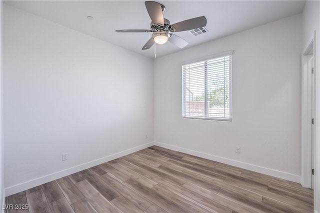 508 Cadence View Way, Henderson, NV 89011 - empty room with wood finished floors, baseboards, and ceiling fan