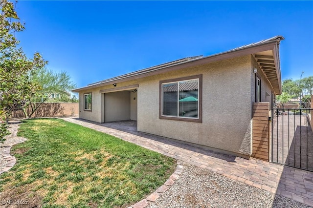 508 Cadence View Way, Henderson, NV 89011 - rear view of house with stucco siding and a patio