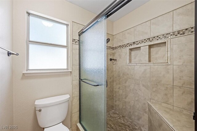 1929 Stonington Pl, Las Vegas, NV 89108 - bathroom featuring tiled shower and toilet