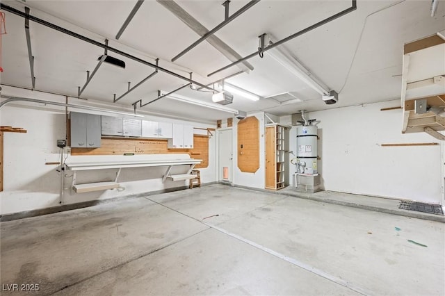 1929 Stonington Pl, Las Vegas, NV 89108 - garage featuring a garage door opener and secured water heater