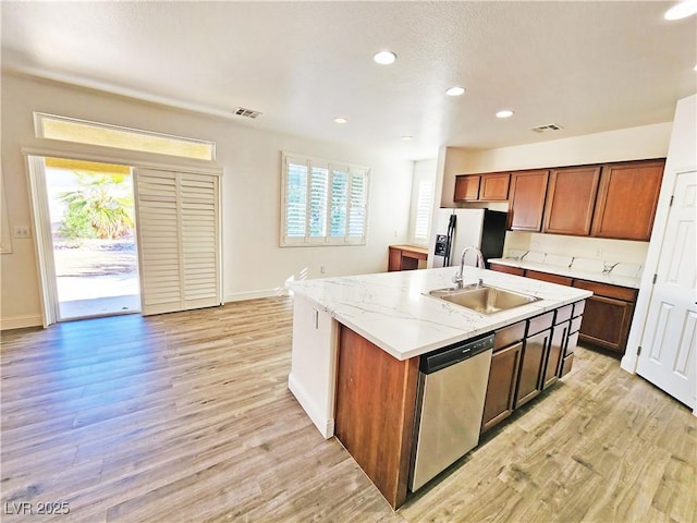 3829 N Mayfield Ranch Rd, Pahrump, NV 89060 - kitchen with a sink, dishwasher, refrigerator with ice dispenser, light wood-style flooring, and recessed lighting