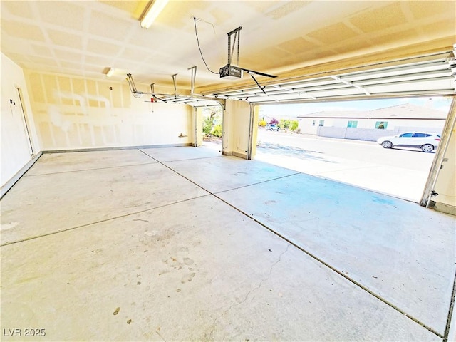 3829 N Mayfield Ranch Rd, Pahrump, NV 89060 - garage featuring a garage door opener