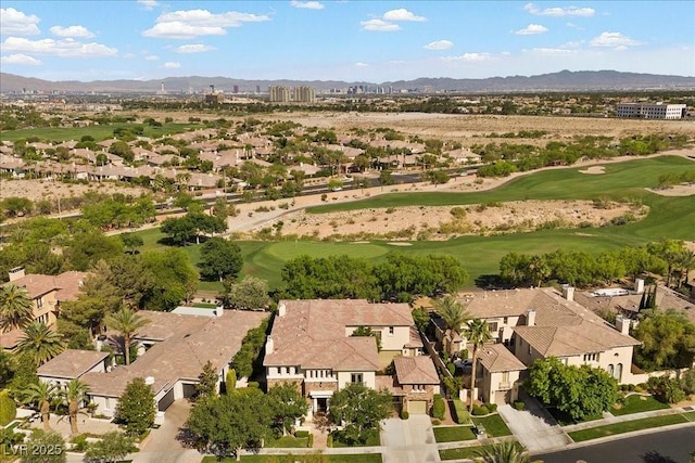300 N Royal Ascot Dr, Las Vegas, NV 89144 - aerial perspective of suburban area with a local golf course and a mountainous background