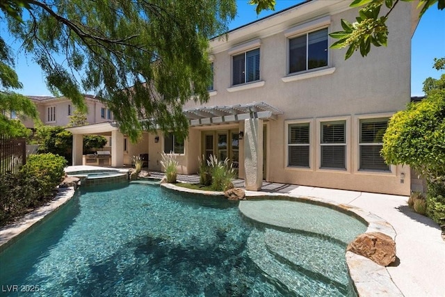 300 N Royal Ascot Dr, Las Vegas, NV 89144 - back of house featuring a pergola, stucco siding, a patio, and a pool with connected hot tub
