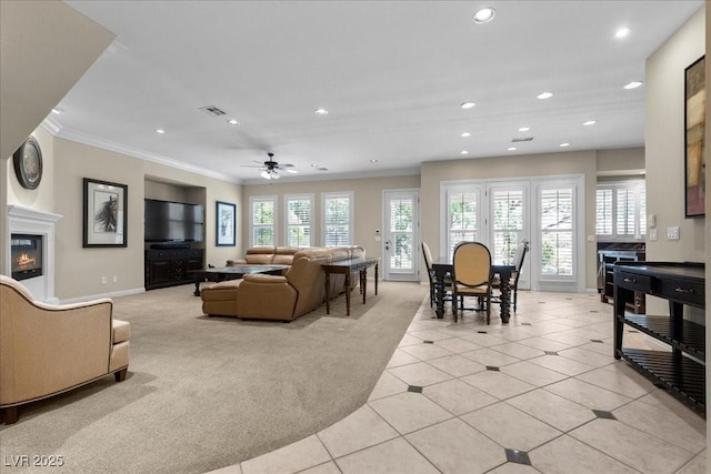 300 N Royal Ascot Dr, Las Vegas, NV 89144 - living area with crown molding, light carpet, recessed lighting, light tile patterned floors, and a ceiling fan