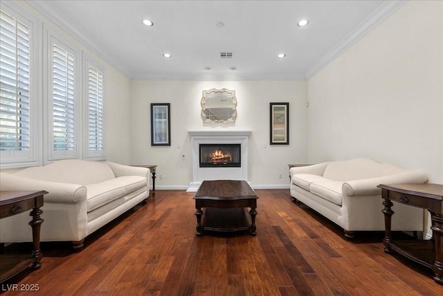 300 N Royal Ascot Dr, Las Vegas, NV 89144 - living area with crown molding, wood finished floors, a lit fireplace, and recessed lighting